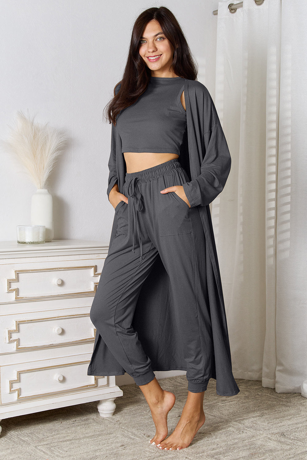 Conjunto de camiseta de tirantes, pantalón y cárdigan con bolsillos